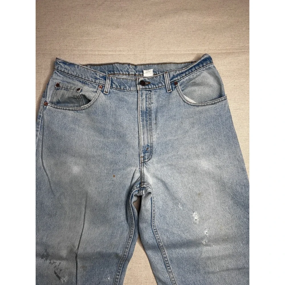 Vintage Levi's 560 Jeans Men's 38x30 Loose Fit Tapered Leg Light Wash USA
